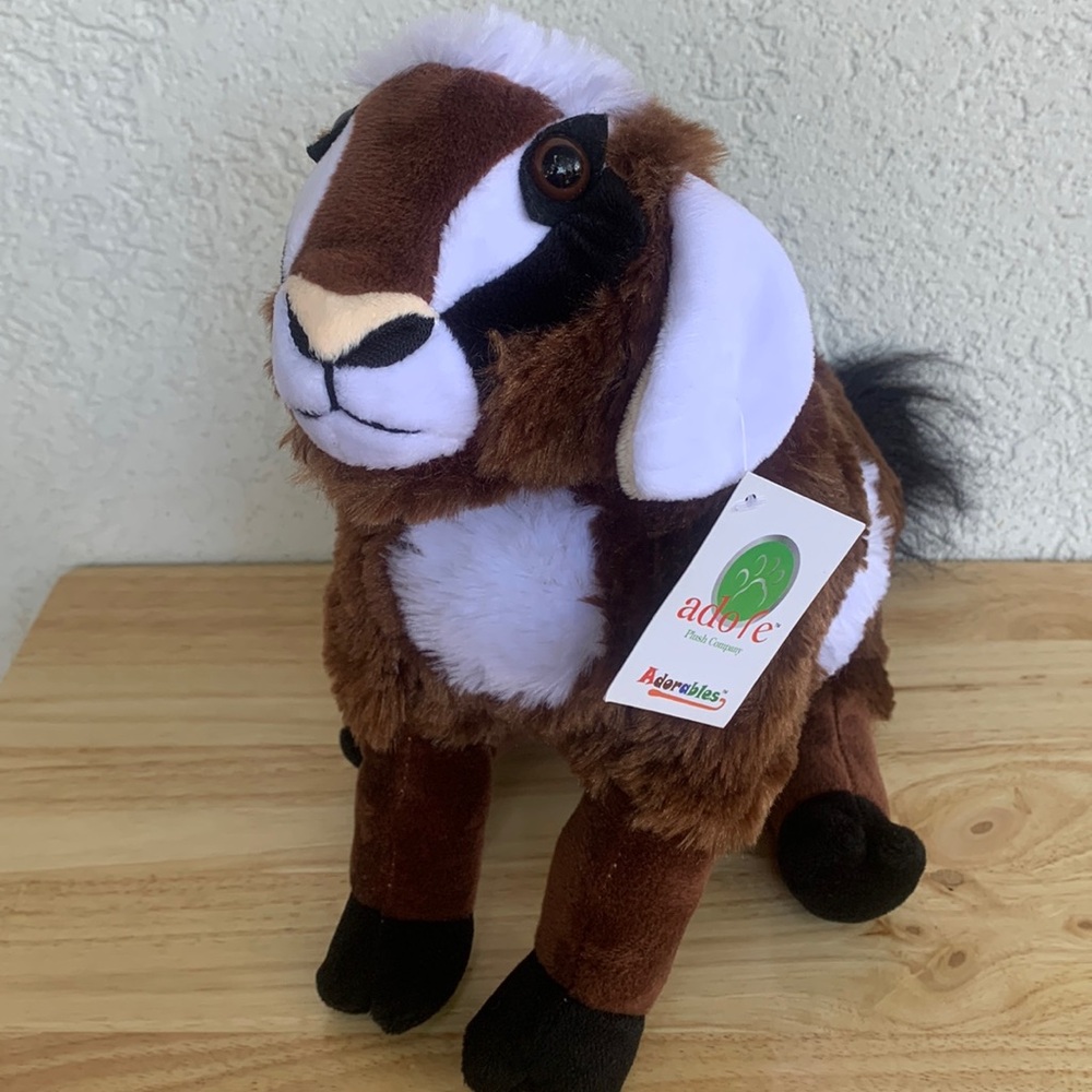 Brown, black and white plush goat stuffie. Try goat yoga in the comfort of home